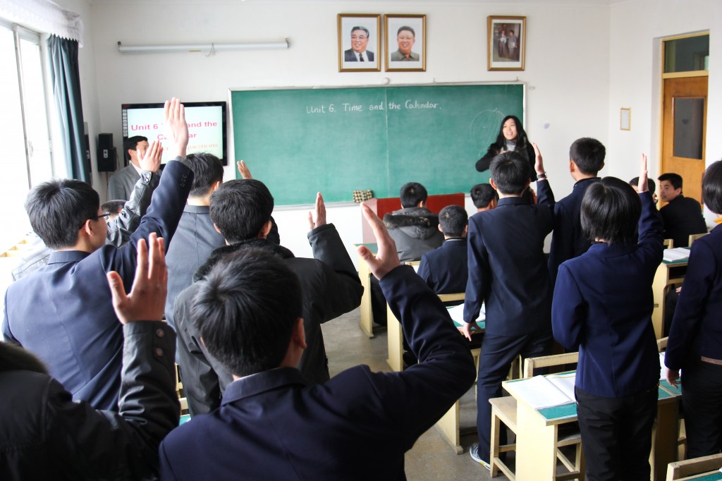 "Raised Hands" by Andrew Cheng. Taken in Pyongsong, North Korea.