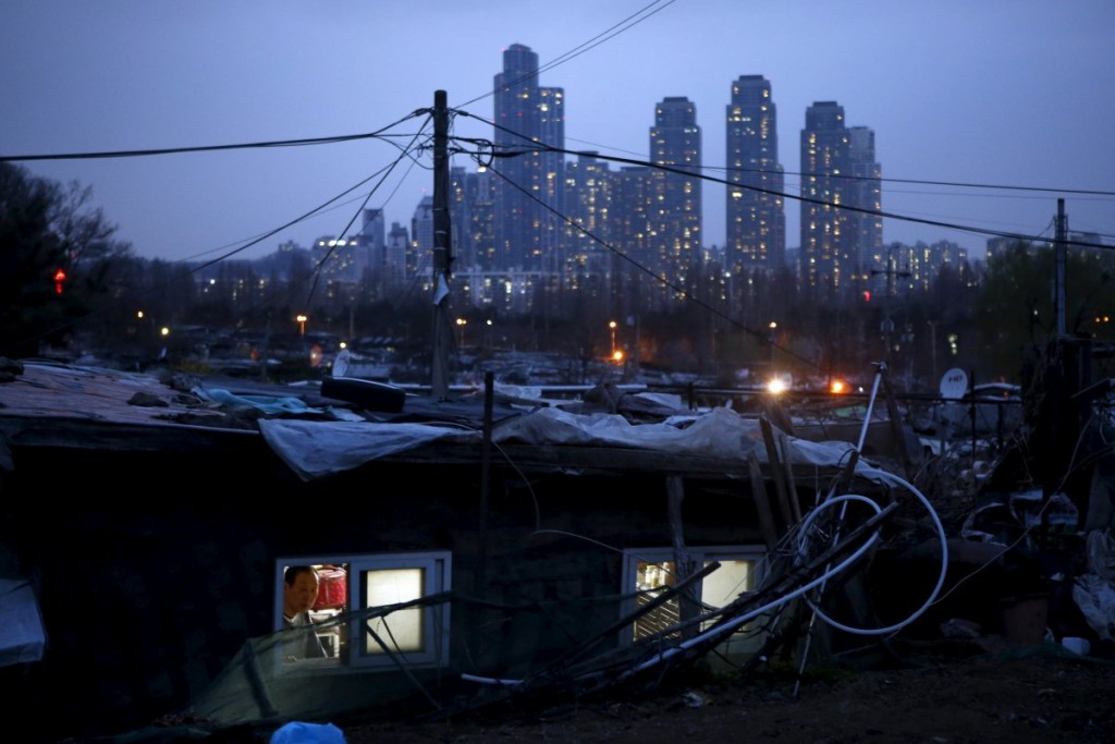 In spite of miraculous growth which has seen high rises become a ubiquitous part of Korean life, urban slums are equally commonplace. Pictured: Guryong Village, a shanty town on the outskirts of Seoul’s luxurious Gangnam District. Source: Reuters/Kim Hong-Ji.